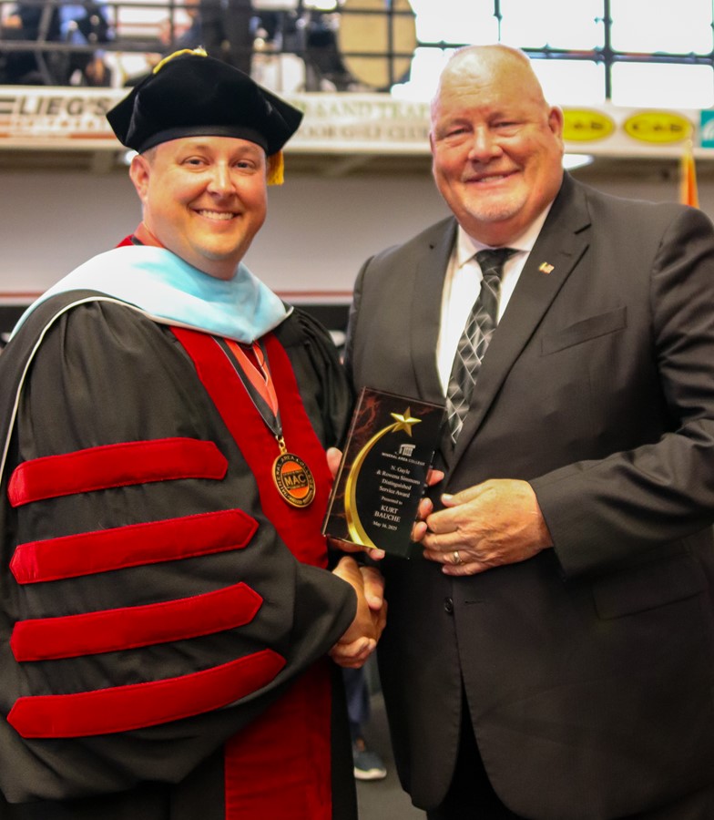Dr. Gilgour presents Kurt Bauche with the N. Gayle and Rowena Simmons Distinguished Service Award