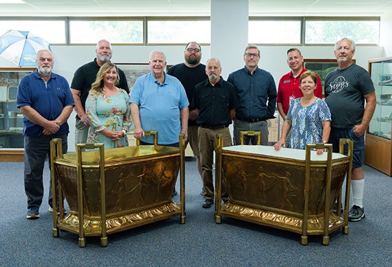 Gary Bunting (World’s Fair collector); Bruce and Melissa Workman (previous owners of one jardiniere); Loyd Ervin (Ervin’s Metalsmiths jardiniere restorationist); Colton Adkisson (history department instructor); Stan Winkler (restorationist); Rodney Wilson (history department coordinator and Gustav Lind researcher); Keith Zoromski (MAC provost); Annette and Gene Fritsche (current owners of both jardinieres). 